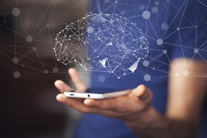 photo of a person's hand holding a cellphone with a digitized image of a brain floating above the cellphone